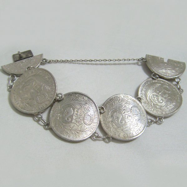 (b1108)Silver bracelet with Peruvian coins.