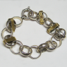(b1508)Silver bracelet with gold appliques.