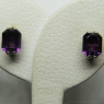 (e1365)Aros de plata con piedra de color lila.
