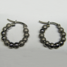 (e1423)Aros de plata del tipo cubanos con bolitas.