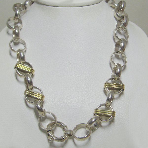 (n1034)Silver choker with gold appliques.