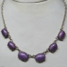 (n1393)Gargantilla de plata con piedras violetas.