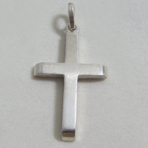 (p1135)Solid silver cross with bombe tips.