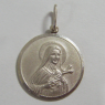 (p1184)Medalla de plata con imagen de la Santa Teresa.