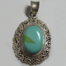(p1260)Colgante de plata oval con piedra turquesa.