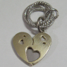 (p1280)Colgante de plata y oro motivo corazn.