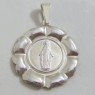 (p1326)Miracle medal with image of Virgien Mary.