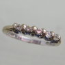 (r1291)Anillo cintillo de oro con 5 brillantes.