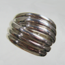 (r1444)Silver ring with intercrossing waves.