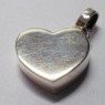 (p1567)Colgante de plata motivo coraz�n abombado.